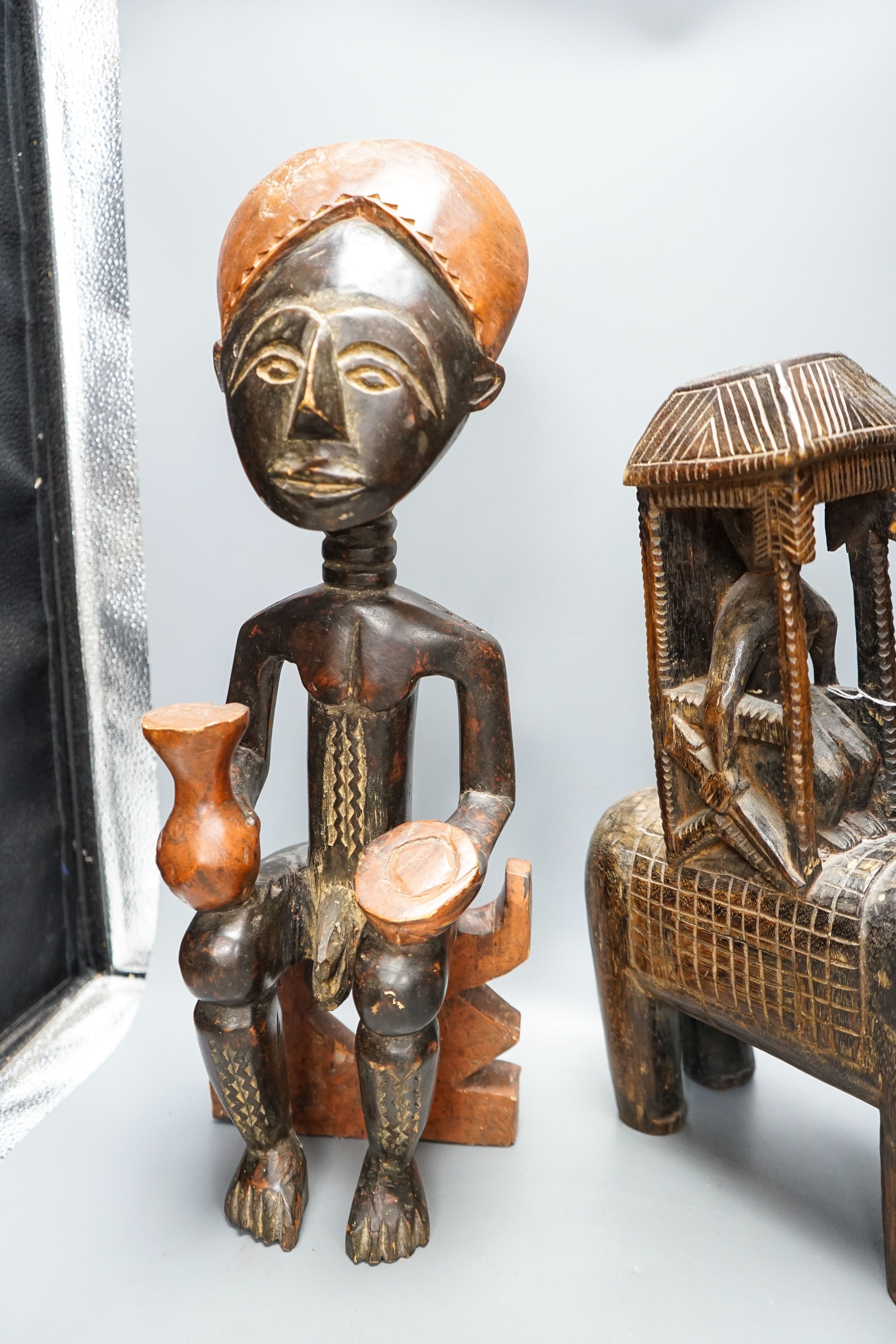 A group of African tribal carvings 53cm